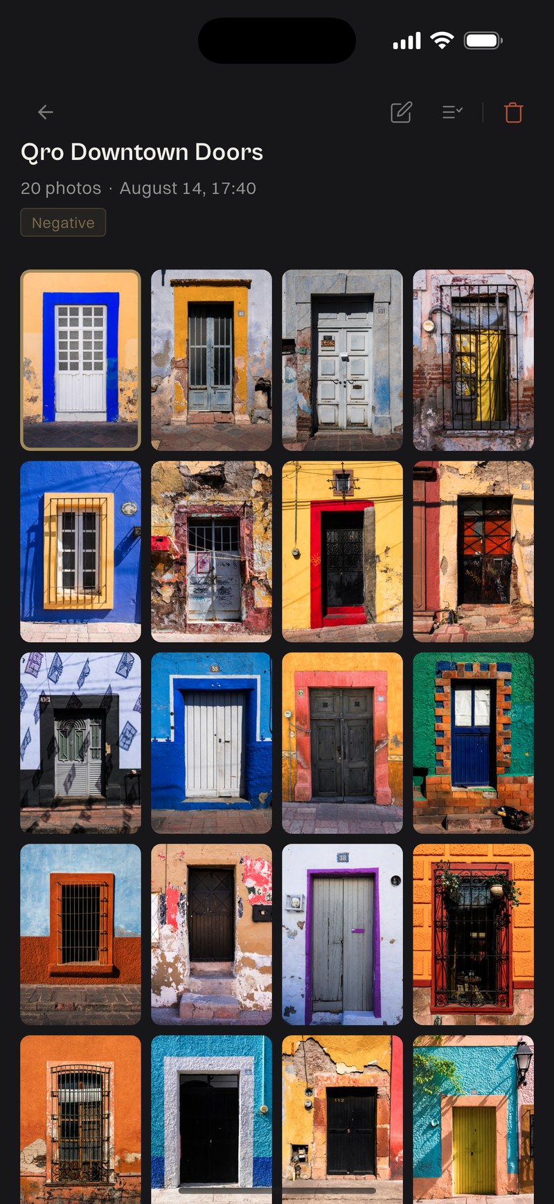 A developed roll of painted doors in Querétaro, shot at 35mm